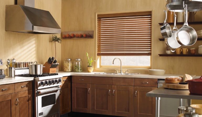 Austin kitchen faux wood blinds.